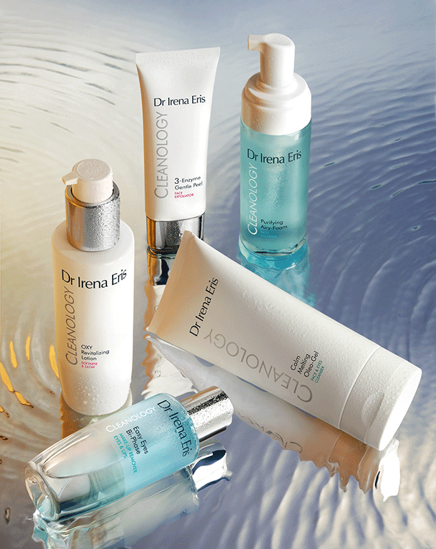 Kosmetyki z linii Body Art i Cleanology, w tle białe róże w wazonie